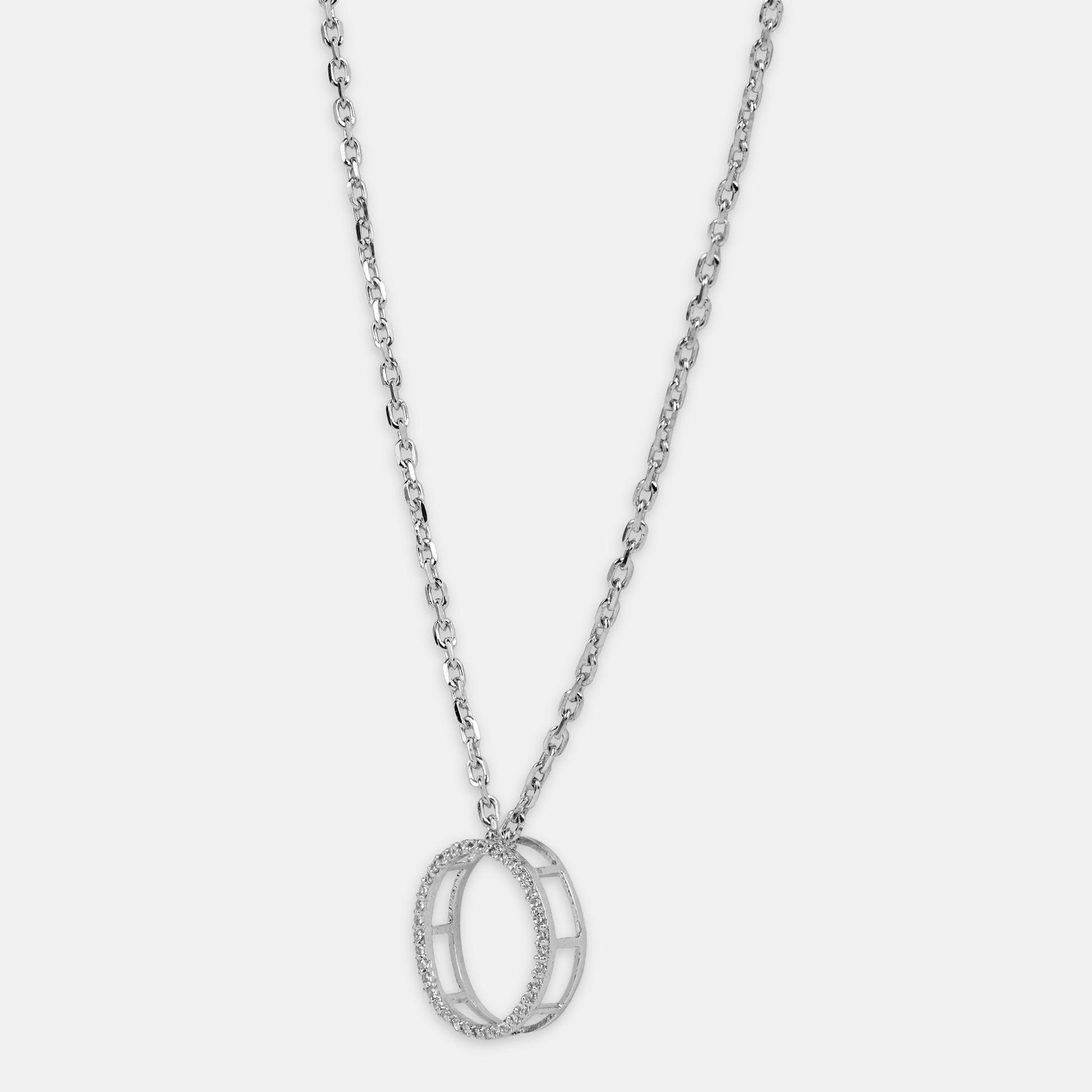 Silver necklace with a unique full moon pendant with american diamonds on plain background