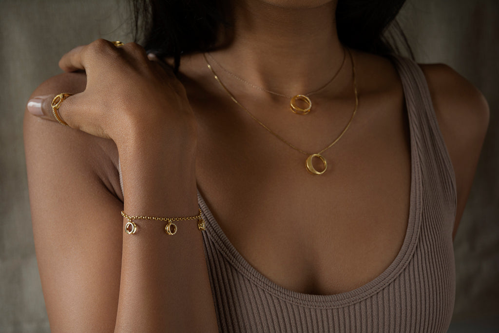 Waxing Gibbous set in 92.5 sterling silver and gold polish with american diamonds
