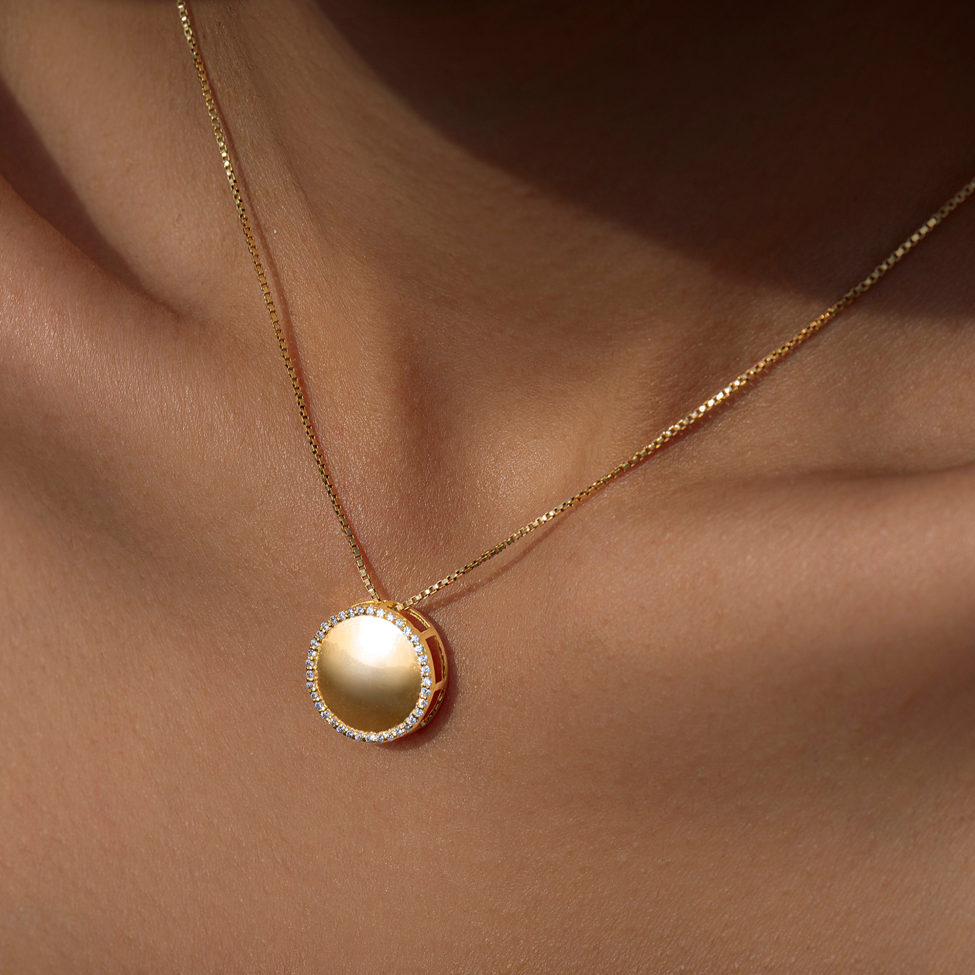 New Moon Pendant with chain in 92.5 Sterling Silver and high gold polish, featuring american diamonds