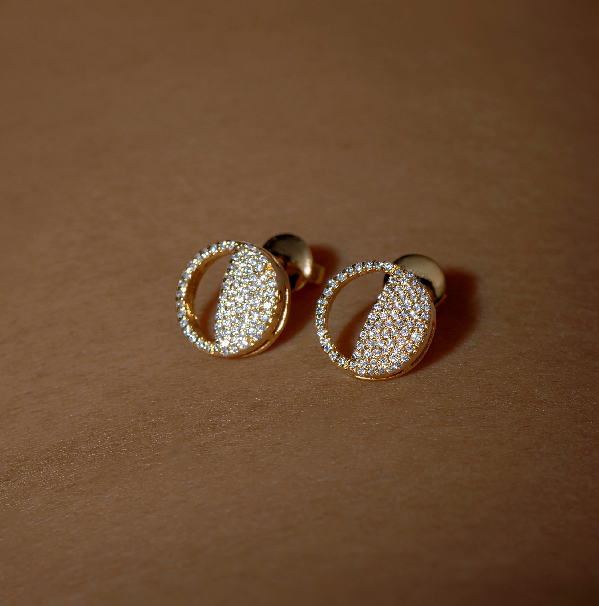 First Quarter Earrings in 92.5 Sterling Silver and high gold polish, featuring american diamonds