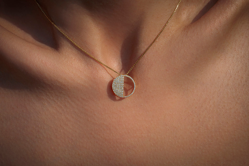First Quarter Pendant in 92.5 Sterling Silver and high gold polish with chain, featuring american diamonds