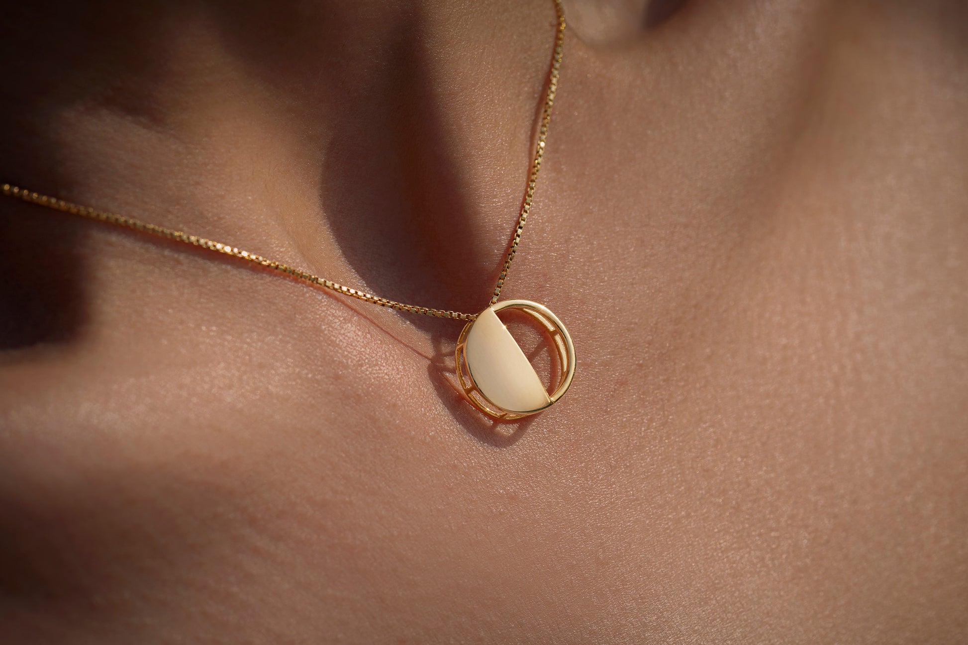 First Quarter Pendant in 92.5 Sterling Silver and high gold polish with chain