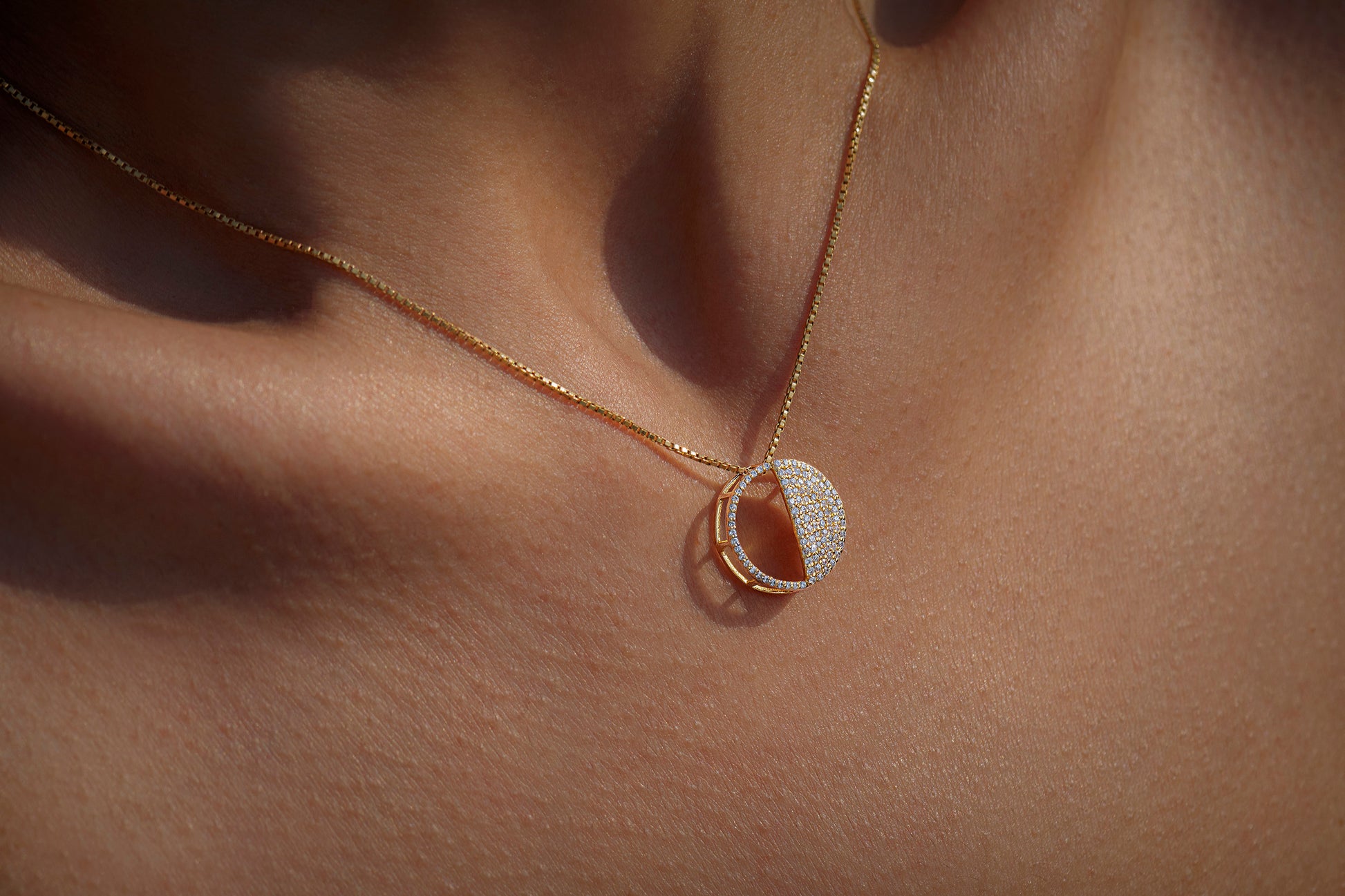 Last Quarter Pendant in 92.5 Sterling Silver and high gold polish with chain, featuring american diamonds