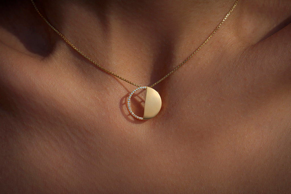 Last Quarter Pendant in 92.5 Sterling Silver and high gold polish with chain, featuring american diamonds