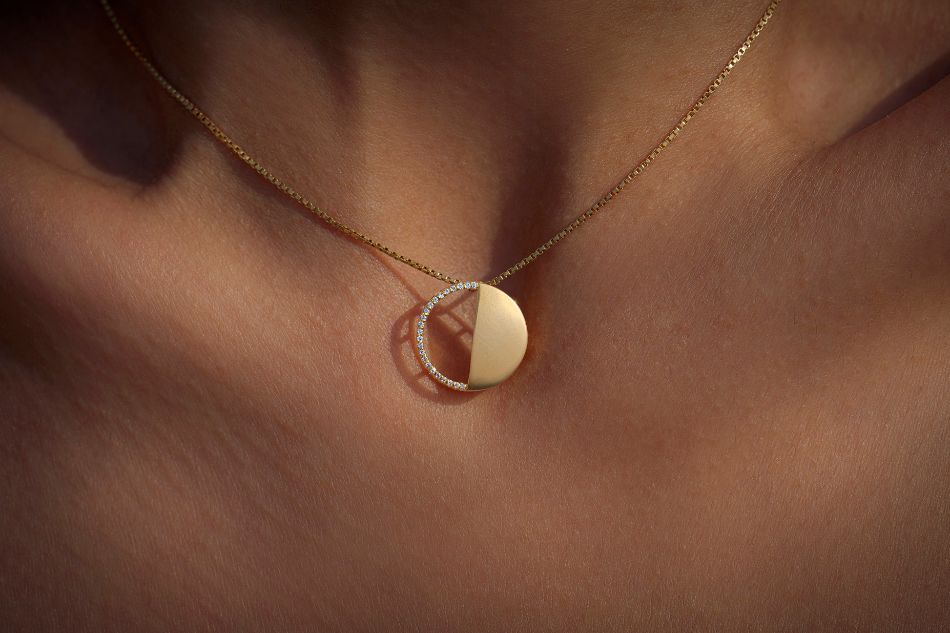 Last Quarter Pendant in 92.5 Sterling Silver and high gold polish with chain, featuring american diamonds