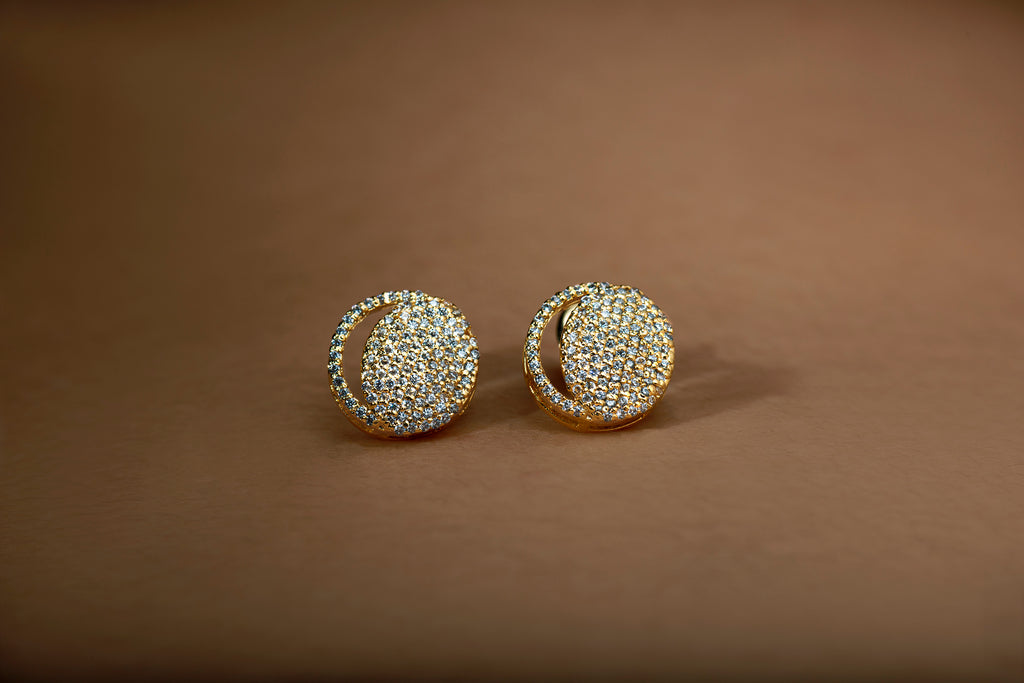 Waning Crescent Earing in 92.5 Sterling Silver and high gold polish, featuring american diamonds