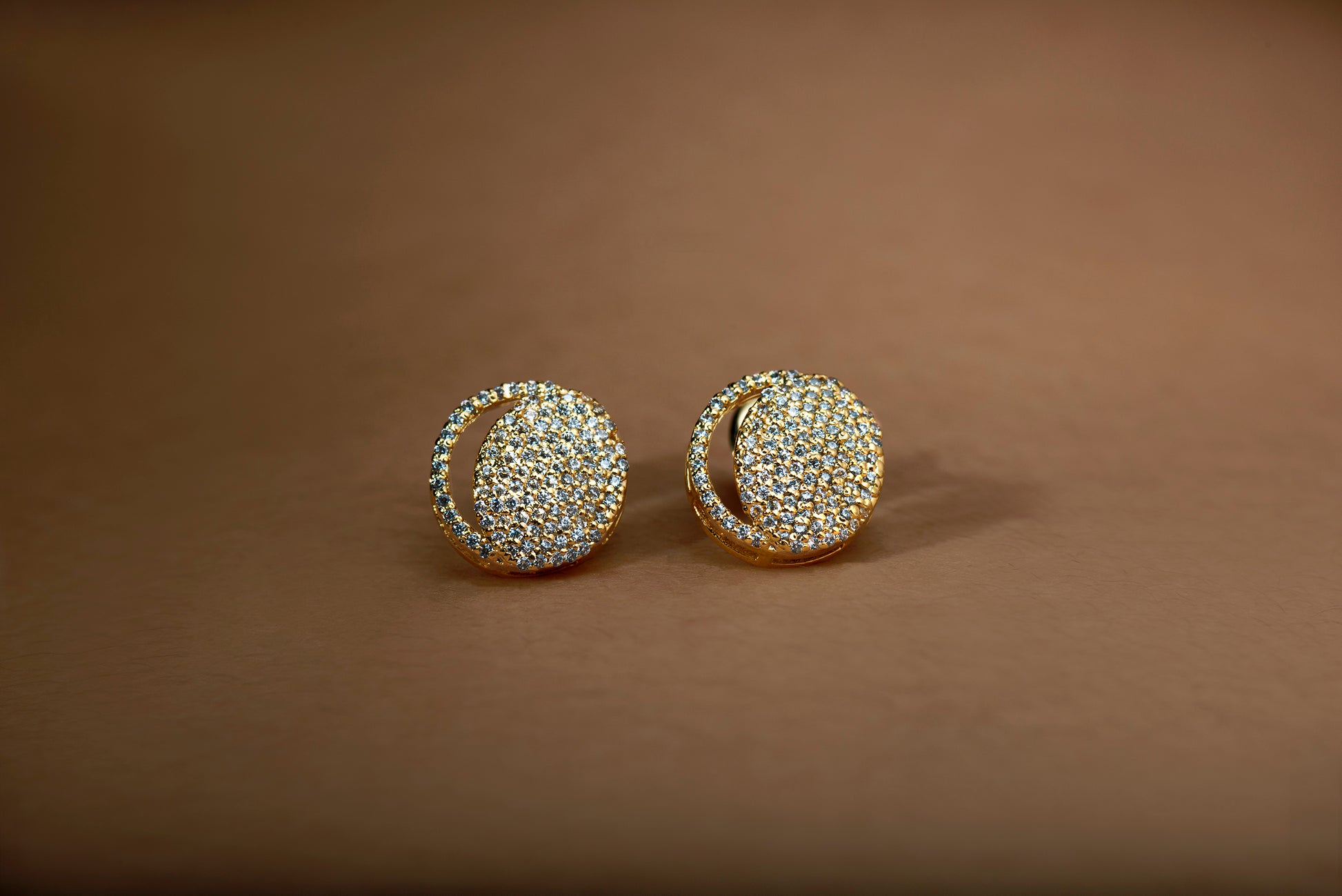 Waning Crescent Earing in 92.5 Sterling Silver and high gold polish, featuring american diamonds