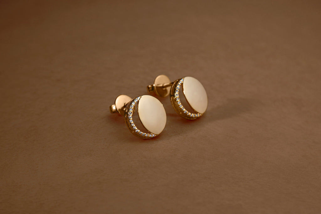 Waning Crescent Earing in 92.5 Sterling Silver and high gold polish, featuring american diamonds