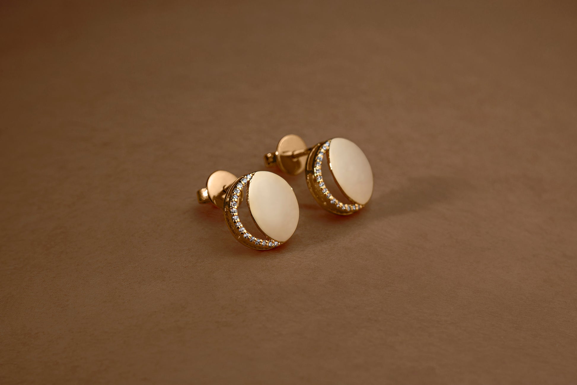 Waning Crescent Earing in 92.5 Sterling Silver and high gold polish, featuring american diamonds