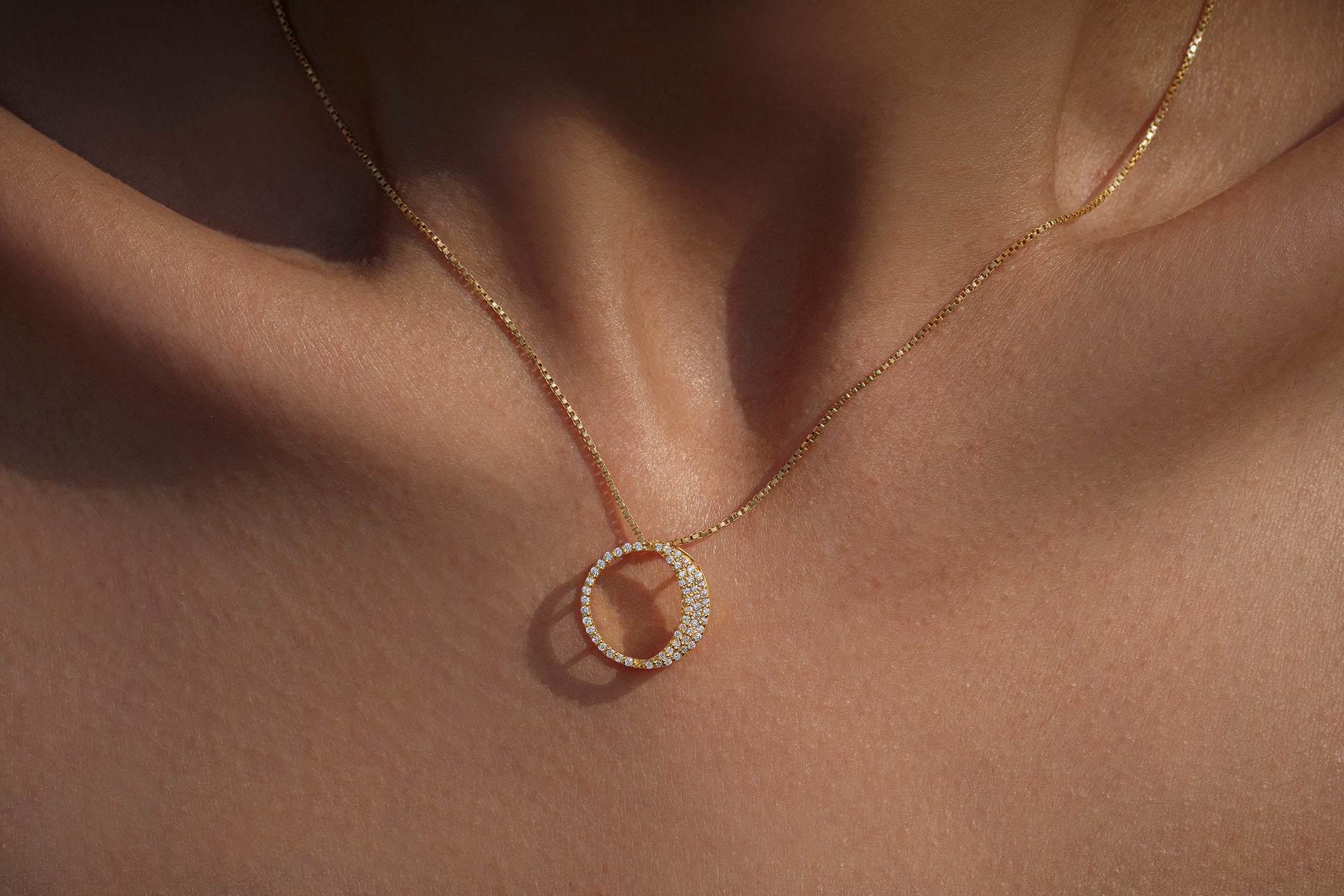 Waxing Gibbous Pendant in 92.5 sterling silver and gold polish with american diamonds