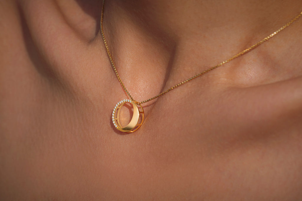 Waxing Gibbous Pendant in 92.5 sterling silver and gold polish with american diamonds