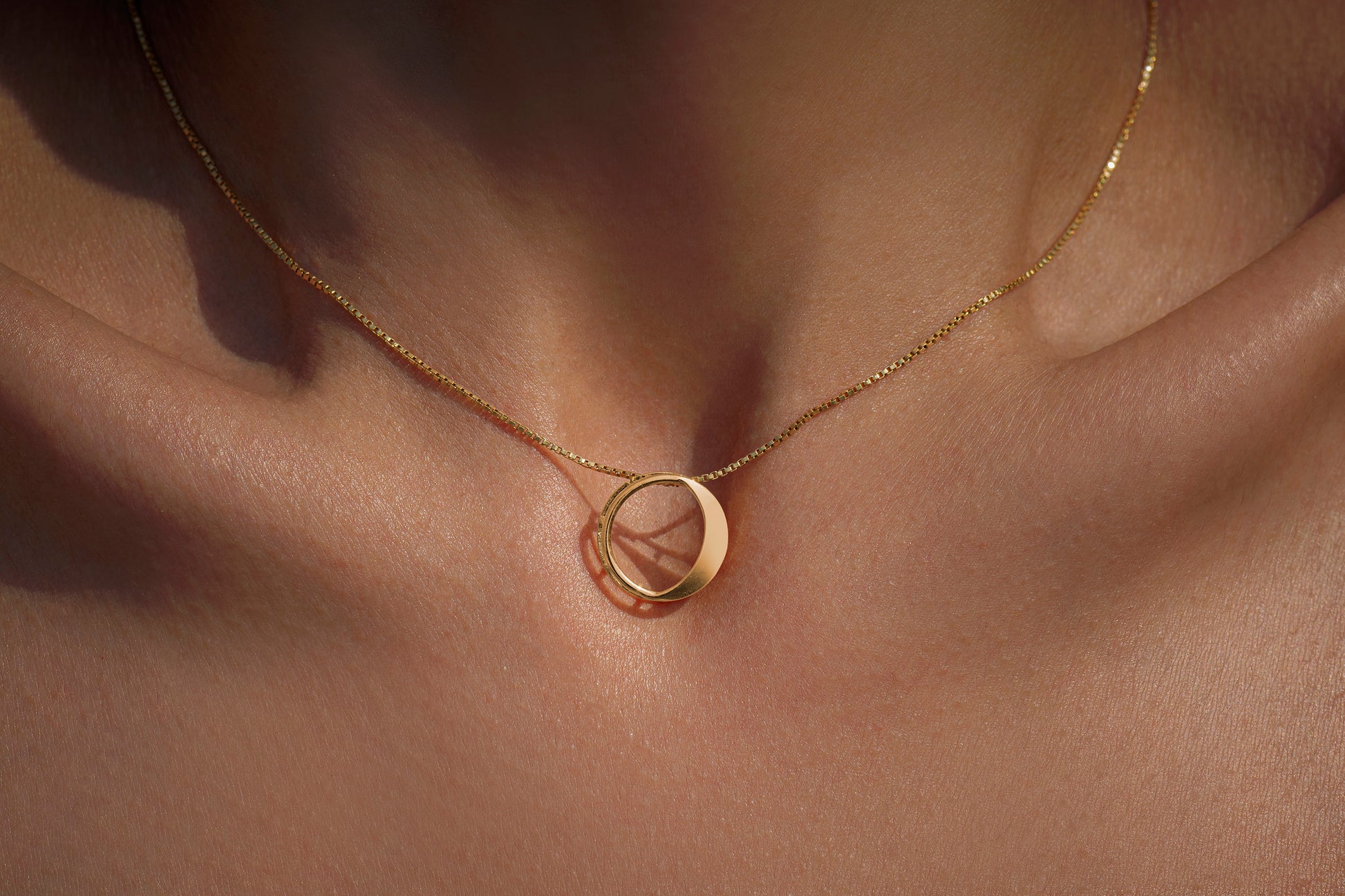 Waxing Gibbous Pendant in 92.5 sterling silver and gold polish with american diamonds