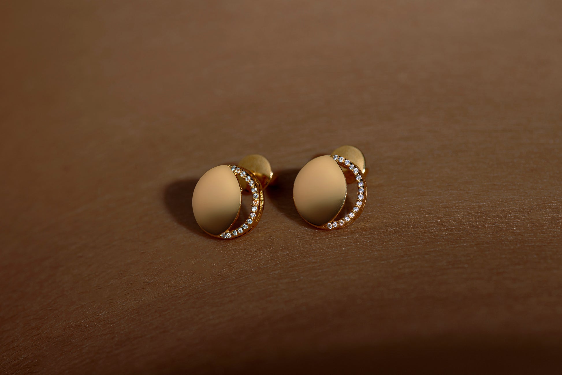 Waxing Crescent Earring in 92.5 Sterling Silver and high gold polish, featuring american diamonds