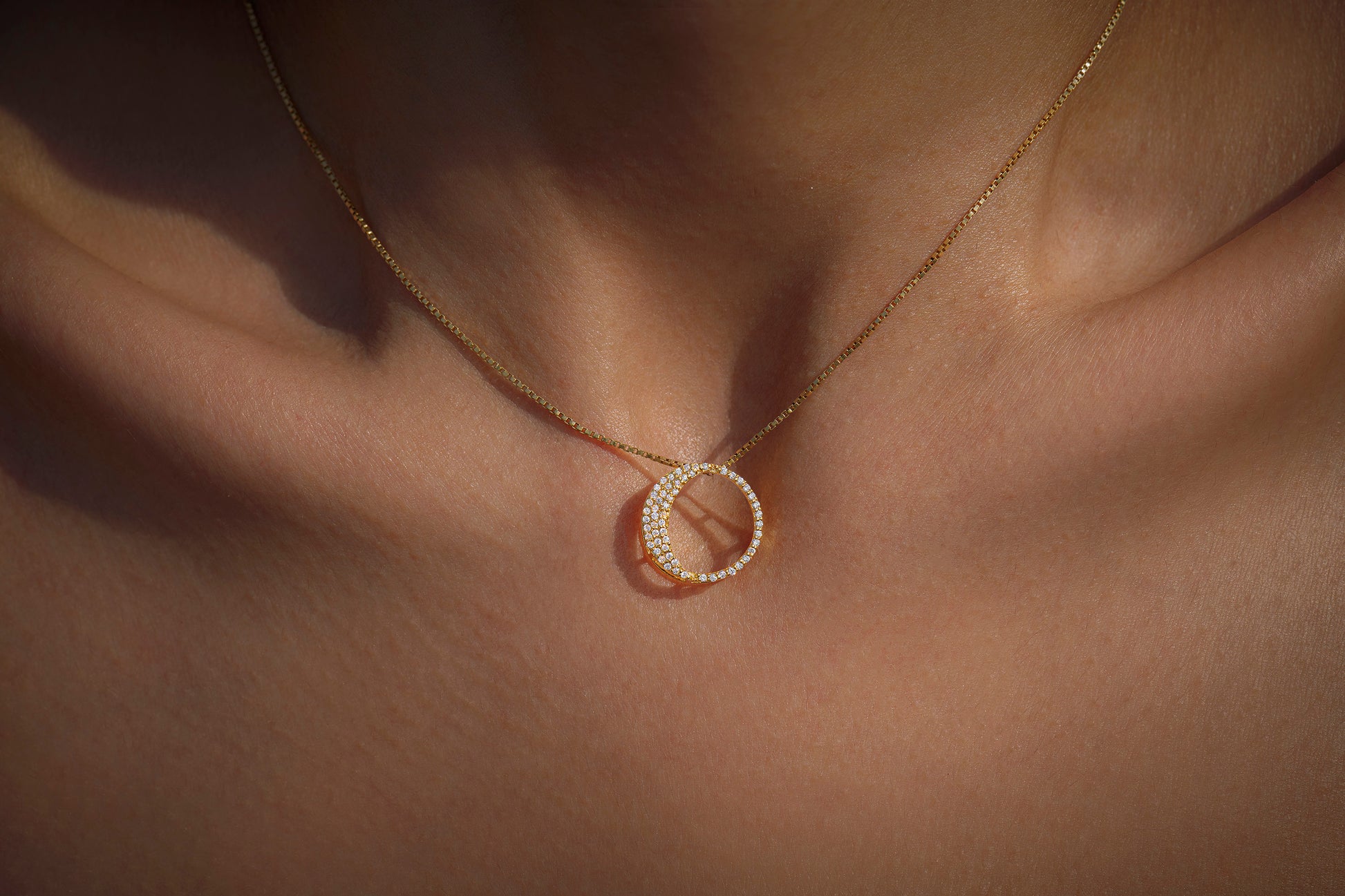 Waxing Gibbous Pendant in 92.5 sterling silver and gold polish with american diamonds