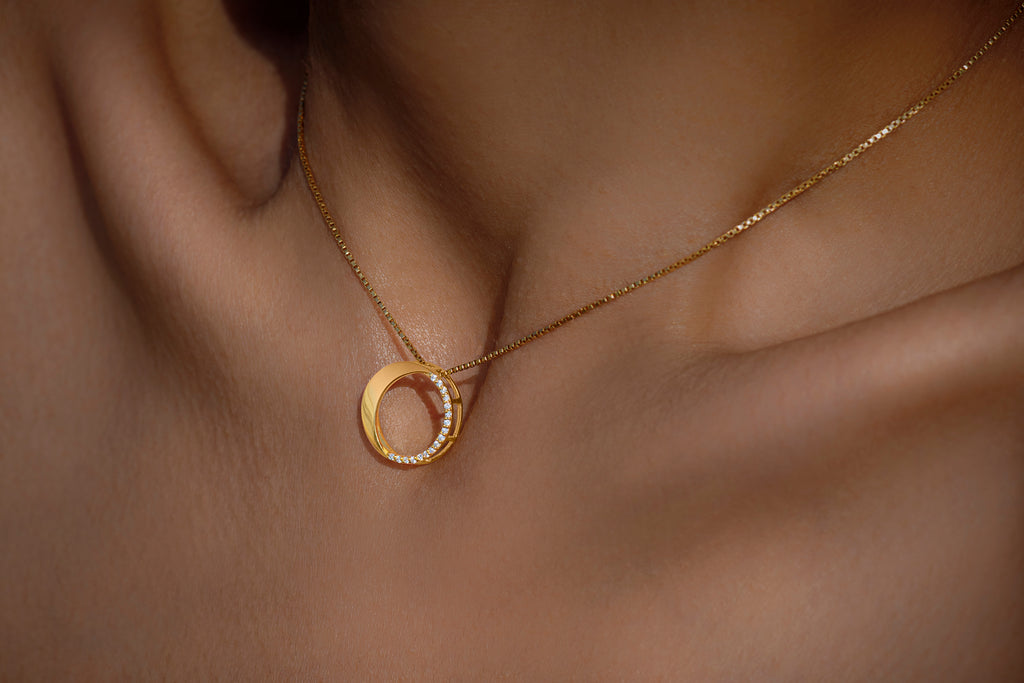 Waxing Gibbous Pendant in 92.5 sterling silver and gold polish with american diamonds