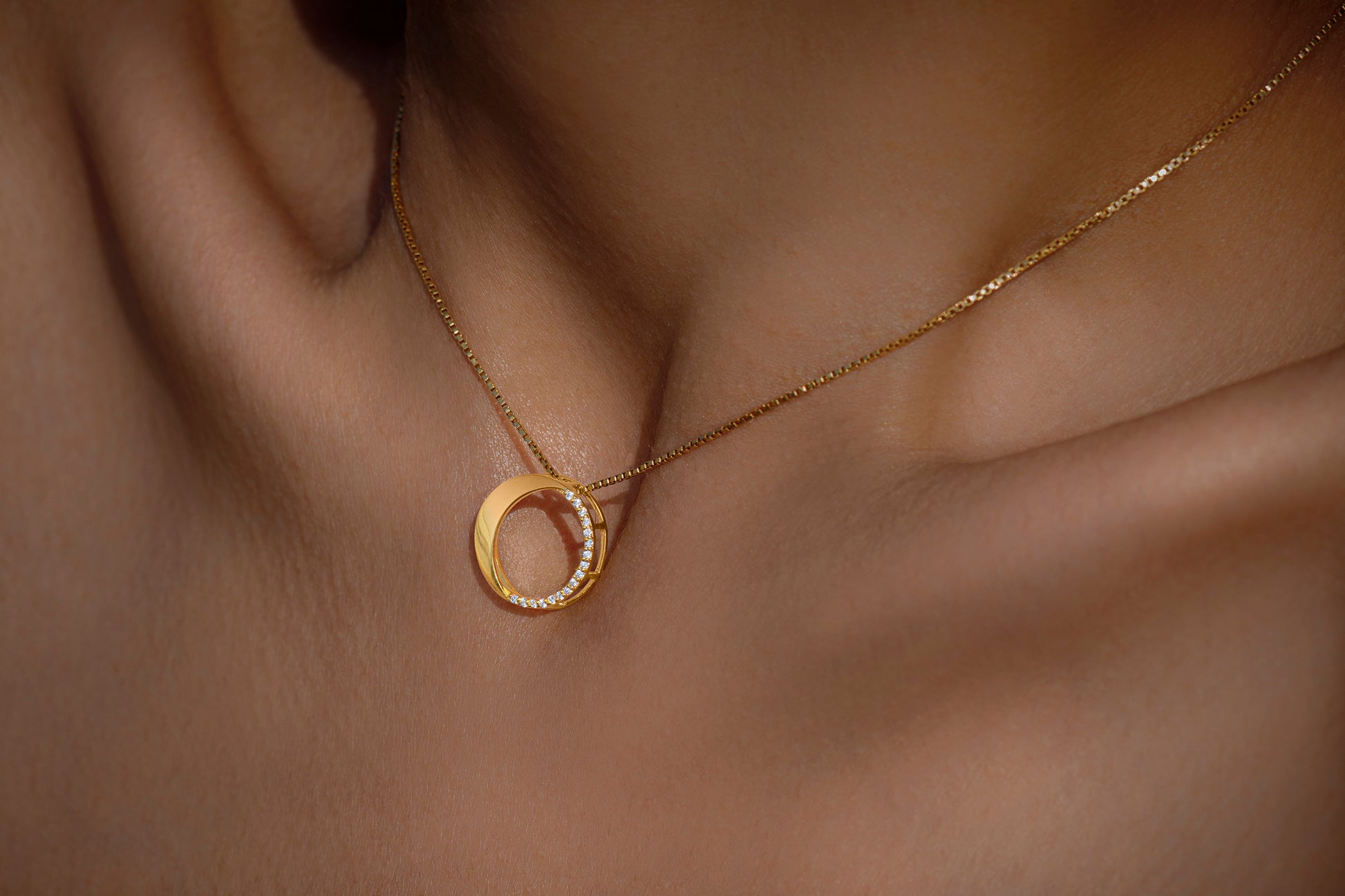 Waxing Gibbous Pendant in 92.5 sterling silver and gold polish with american diamonds